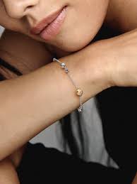 Pandora Two-Tone Sparkling Solar System Chain Bracelet – Elegant Gold & Silver Planet-Themed Jewelry for Women