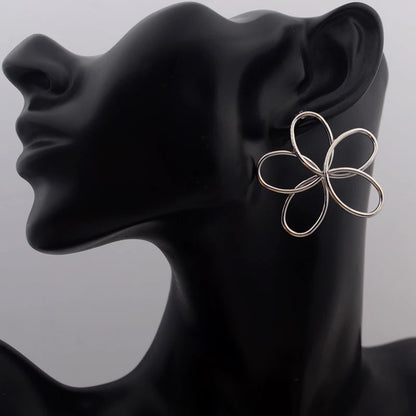 Women’s Golden Flower Dangle Earrings Retro Hollow Metal Wedding Jewelry