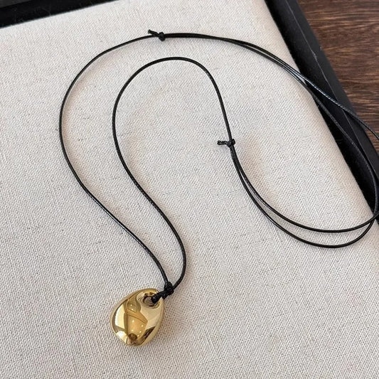 Minimalist Black Leather Rope Necklace Women's Autumn and Winter Simple Fashion Irregular Metal Pendant Long Sweater Chain