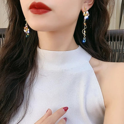 Cute Flower Spiral Dangle Earrings Women Blue Crystal Tassel