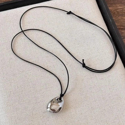 Minimalist Black Leather Rope Necklace Women's Autumn and Winter Simple Fashion Irregular Metal Pendant Long Sweater Chain